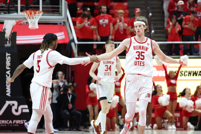 Feb 29, 2024; Salt Lake City, Utah, USA; Utah Utes center Branden Carlson (35) and guard Deivon Smith (5) react to a play against the Stanford Cardinal during the first half at Jon M. Huntsman Center. Mandatory Credit: Rob Gray-USA TODAY Sports